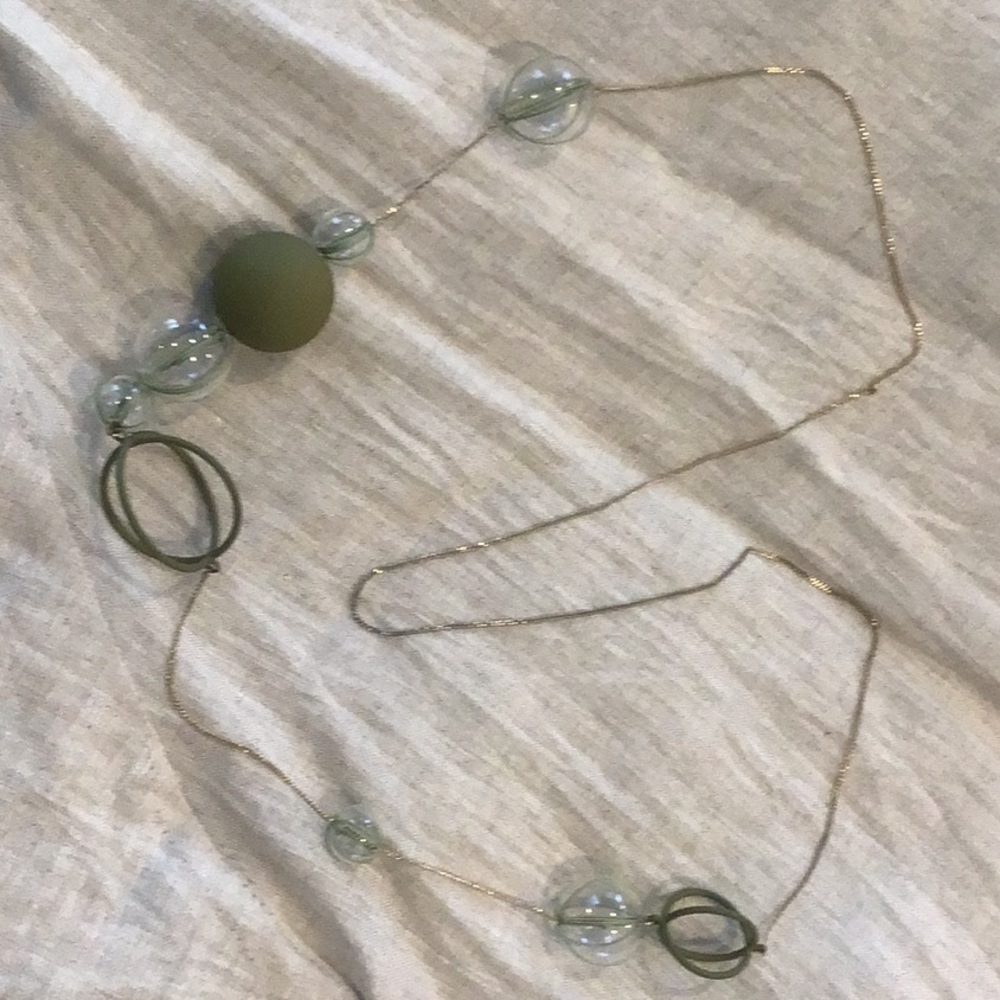 COS brand glass ball necklace on chain.